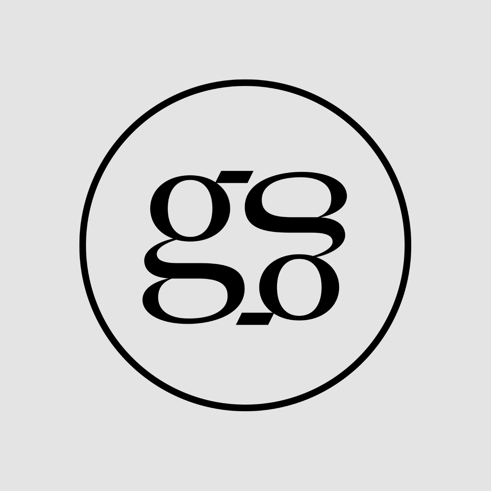 A black circular logo contains the letter pair "gg" in a modern, overlapping design against a light gray background.