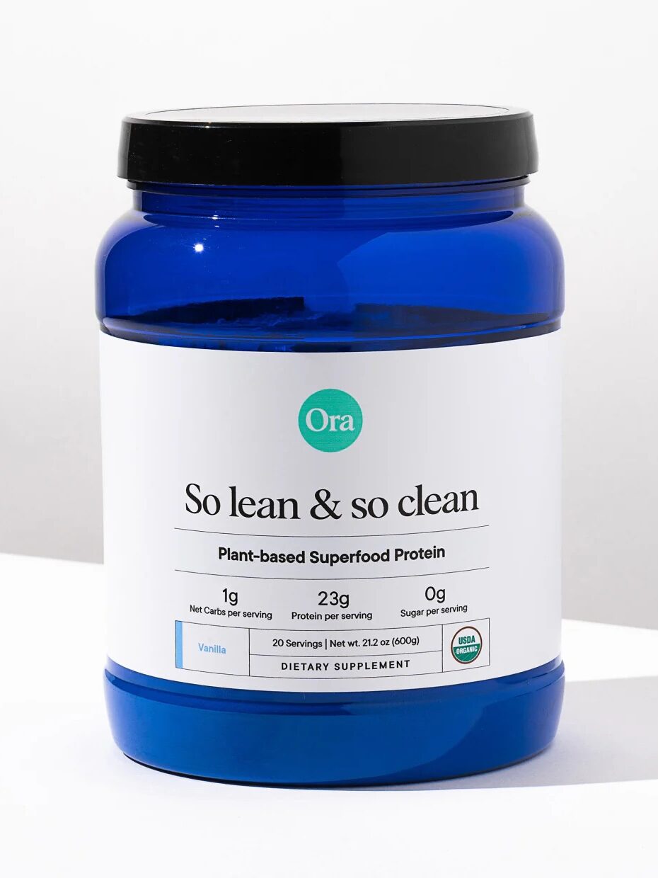 A blue jar of Ora "So lean & so clean" plant-based superfood protein, vanilla flavor, 21.2 oz, sits against a plain background.